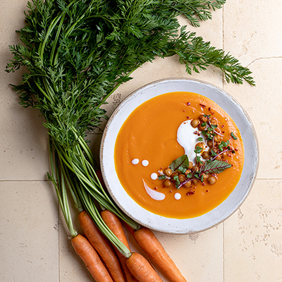 Creamy carrot soup with spicy chickpeas