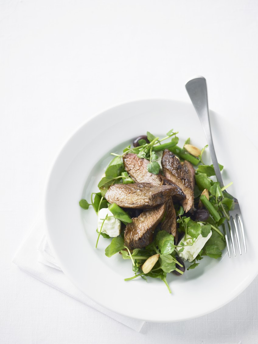 Spiced lamb on spring greens