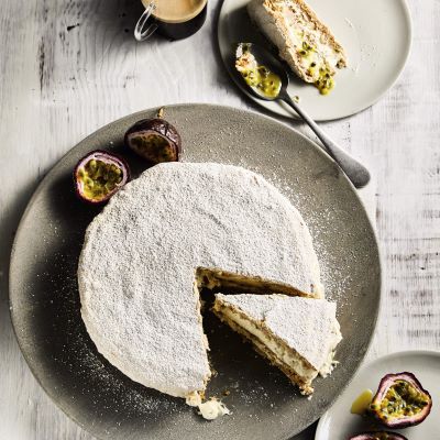 Nut meringue layer cake with banana & passionfruit